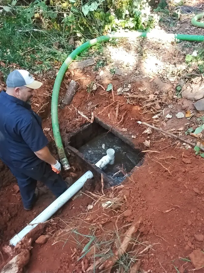 Rooter ProXpress technician on a septic job