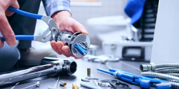 worker doing plumbing services Norcross GA